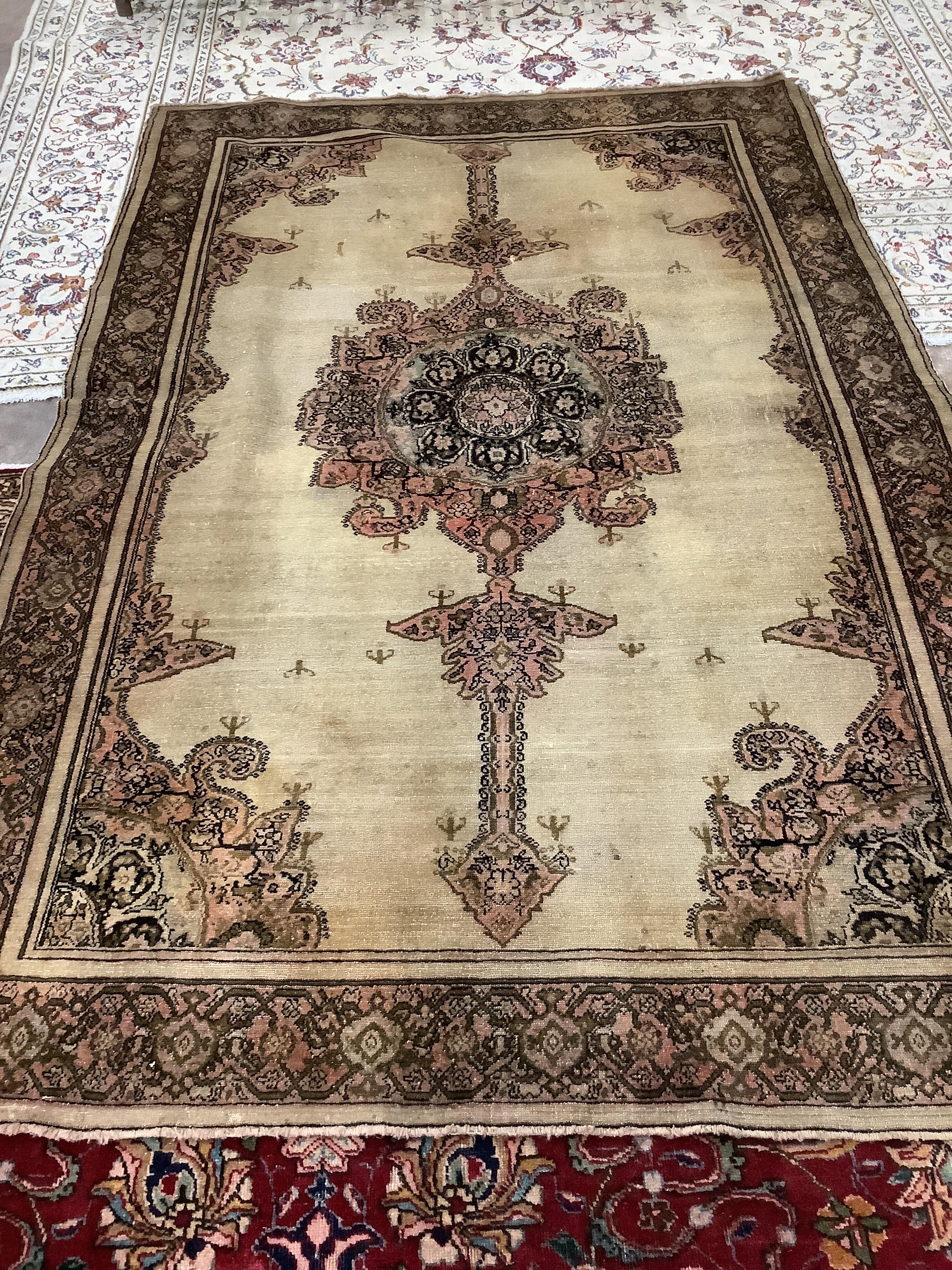 A Malayan ivory ground rug, 210 x 138cm